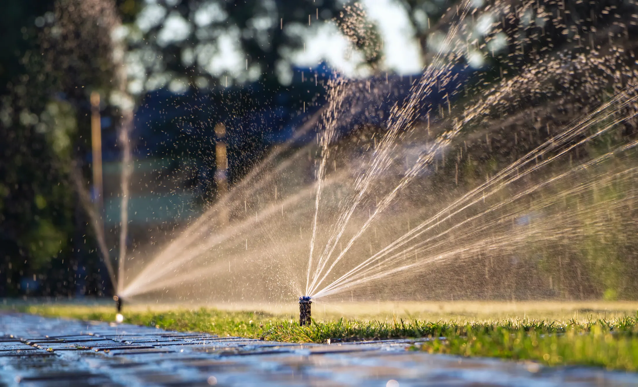 Expert irrigation service - professional technicians maintaining irrigation systems